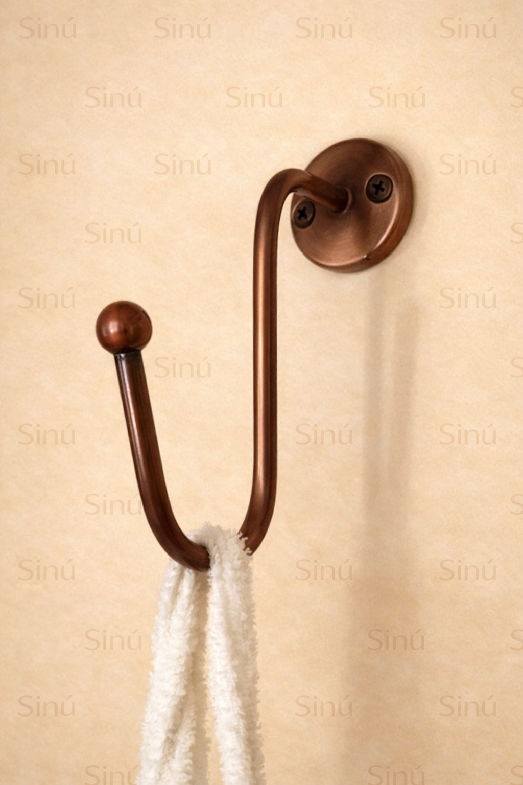 Gancho o perchas en bronce