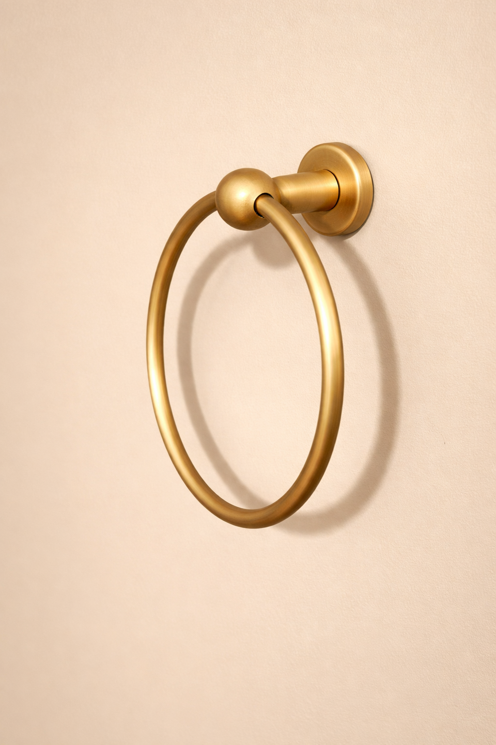 Toallero de manos redondo en bronce Sinú Design