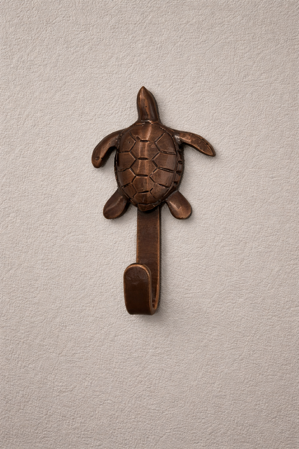 Gancho percha hexágono en bronce Sinú Design